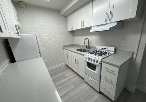 Academia Suites Modern Kitchen With Grey Flooring